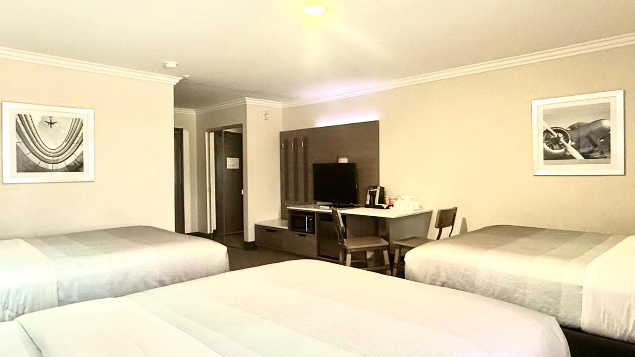Family Room, 3 Queen Beds, Accessible Tub, Non Smoking at Quality Inn & Suites Los Angeles Airport - Stadium District