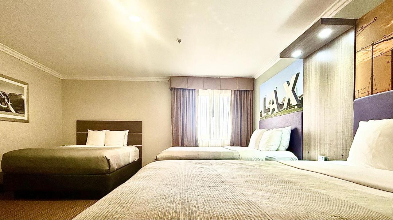 Family Room, 3 Queen Beds, Accessible Tub, Non Smoking at Quality Inn & Suites Los Angeles Airport - Stadium District