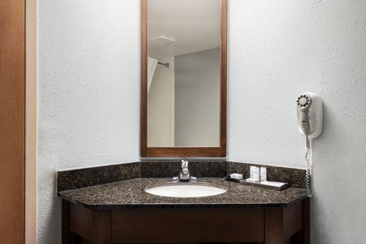 Queen Room with Two Queen Beds - Non-Smoking at AmericInn by Wyndham Madison West