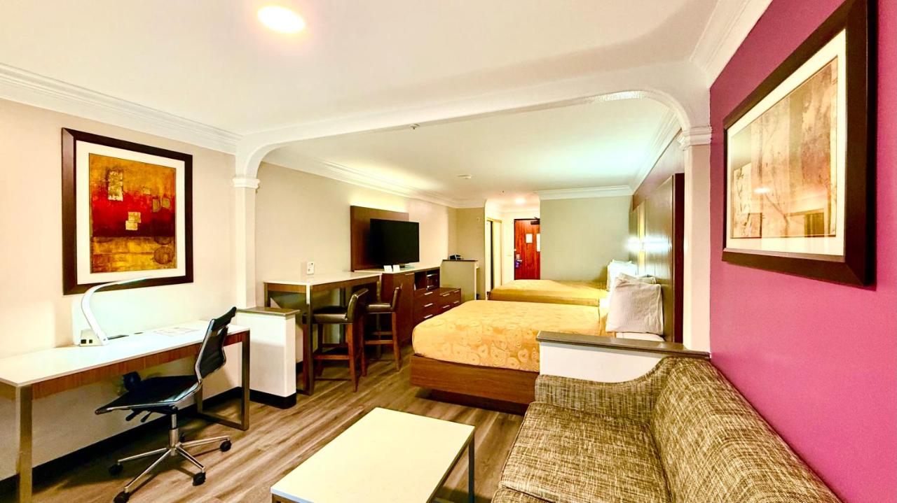 Queen Room with Two Queen Beds and Sofa Bed - Non-Smoking at Best Western Plus Suites Hotel - LAX Airport LA Stadium