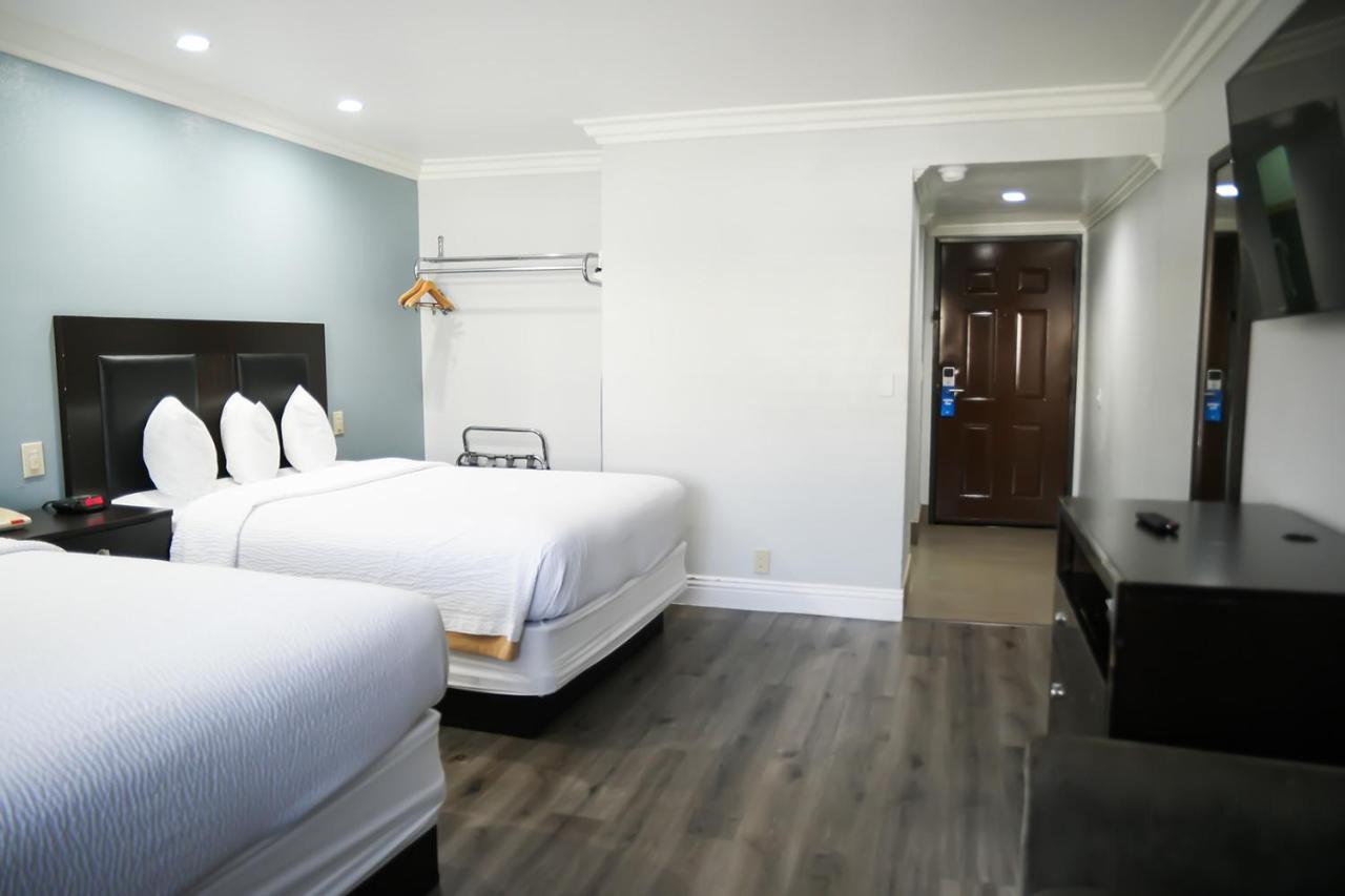 Deluxe Queen Room with Two Queen Beds - Non-Smoking at Days Inn by Wyndham West Covina