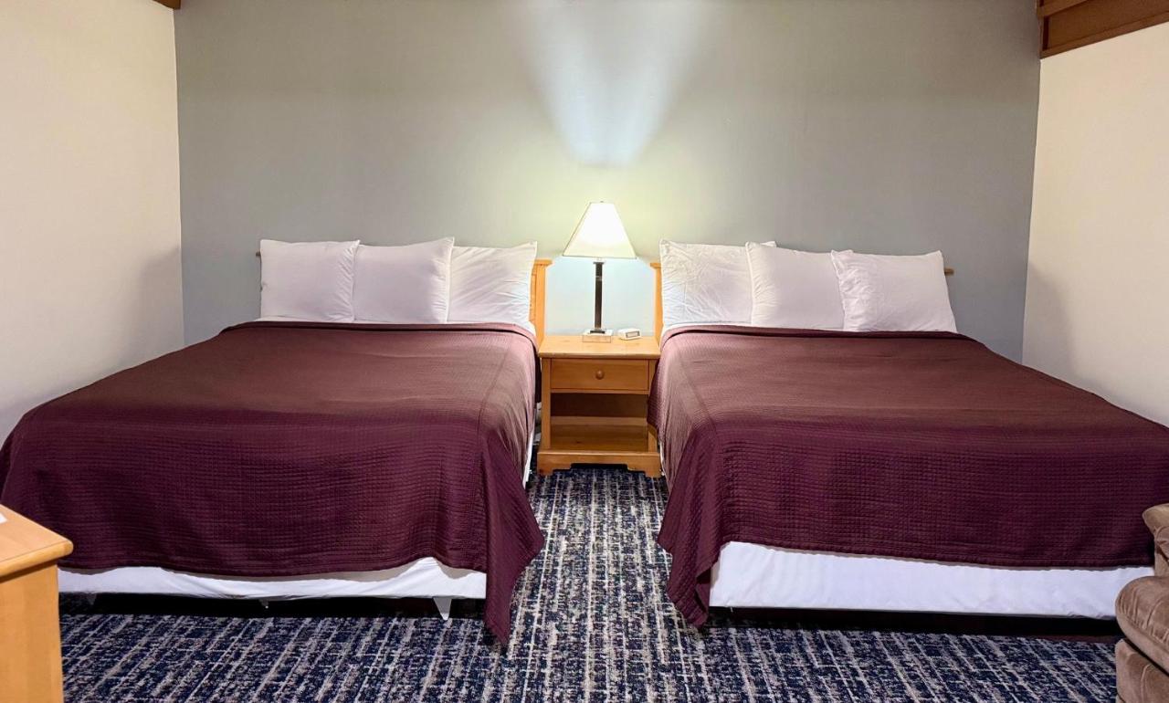 Queen Room with Two Queen Beds at Don Q Inn