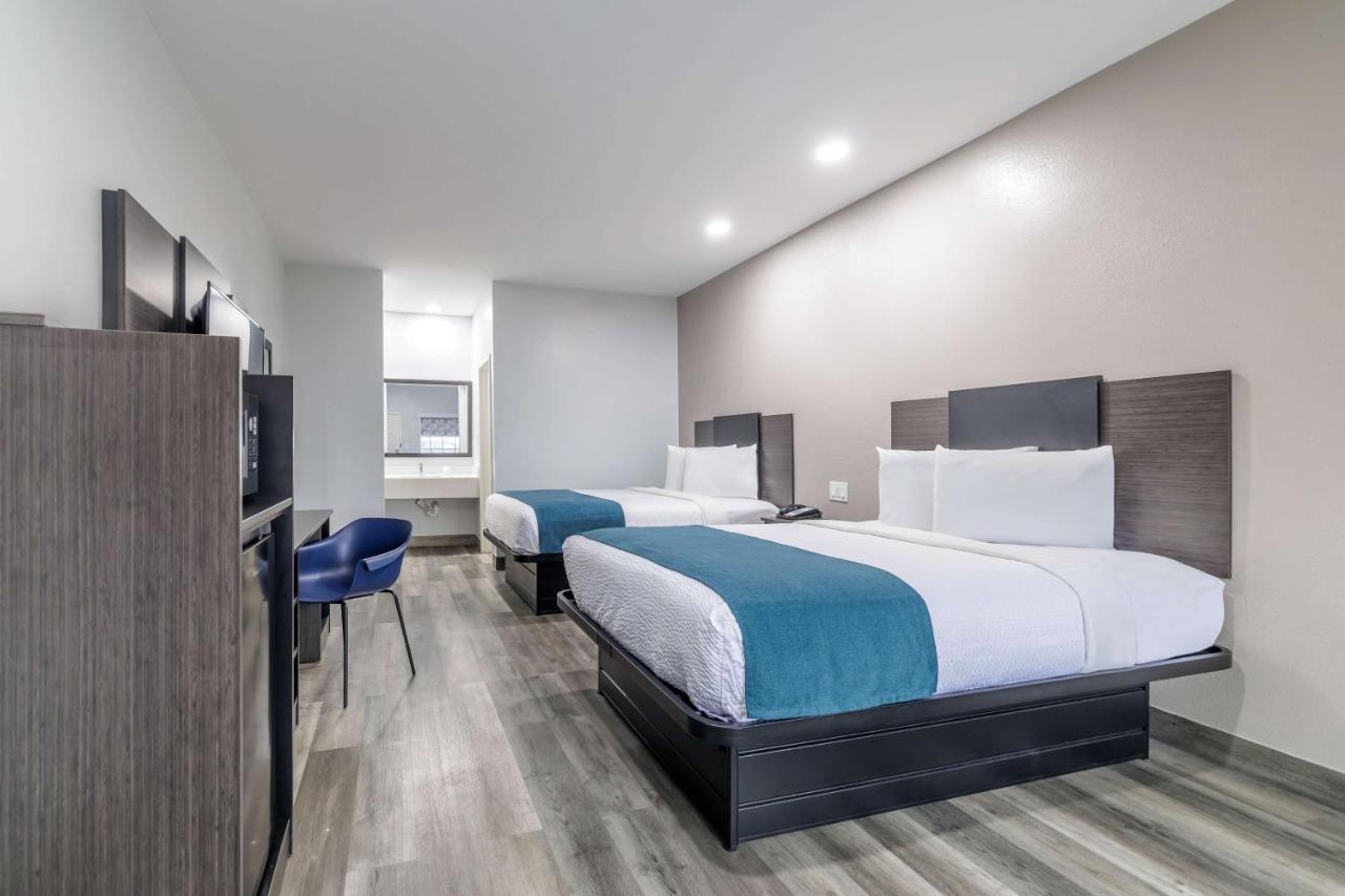 Deluxe Queen Room with Two Queen Beds - Non-Smoking at Motel 6 Brenham, TX