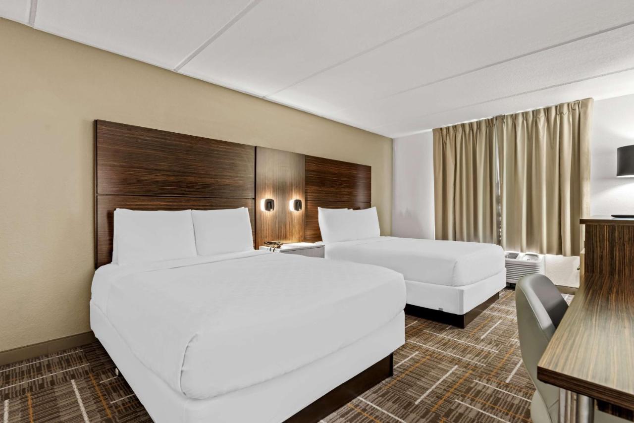 Queen Room with Two Queen Beds - Non-Smoking at Sonesta Essential Orlando Airport