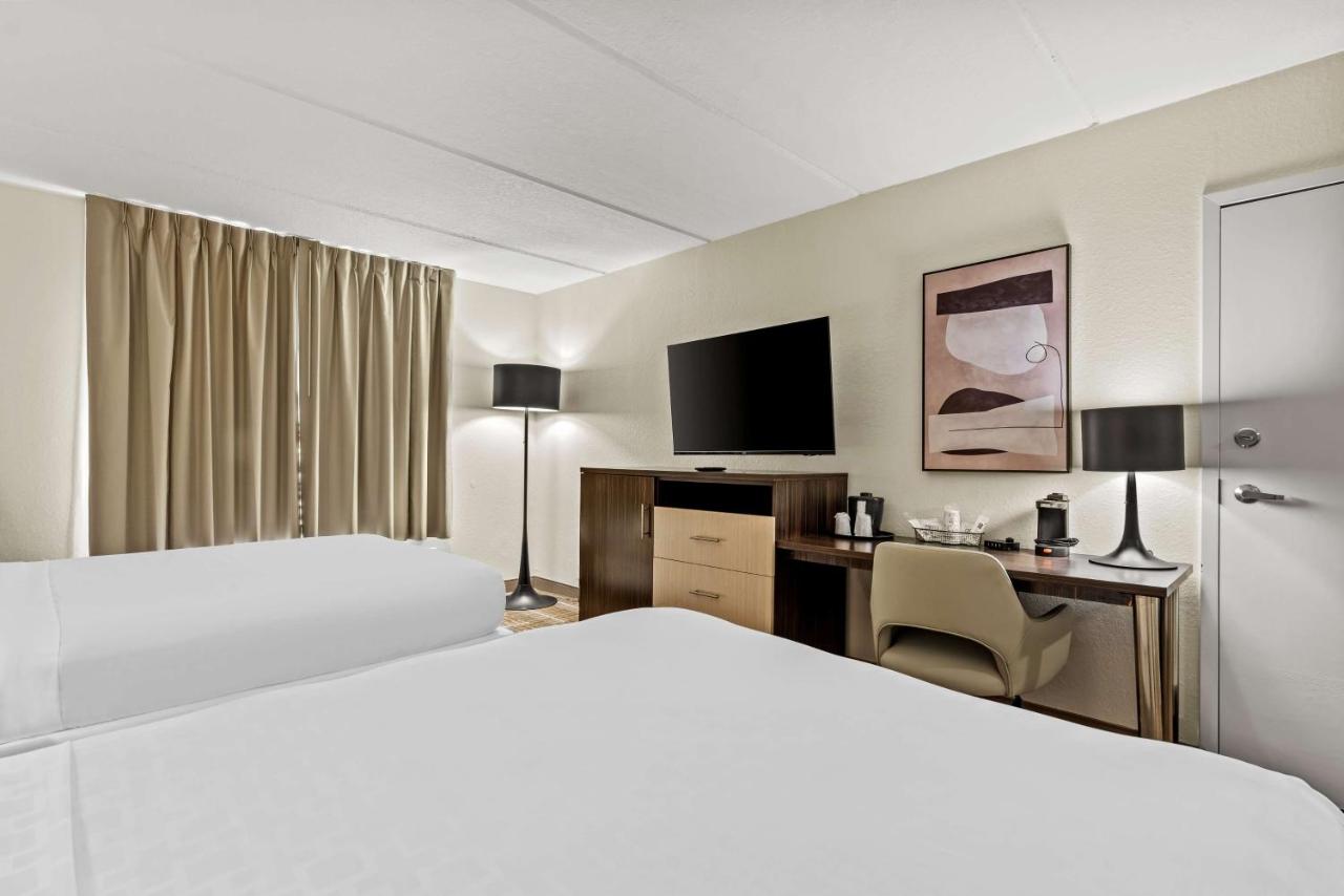 Queen Room with Two Queen Beds - Non-Smoking at Sonesta Essential Orlando Airport