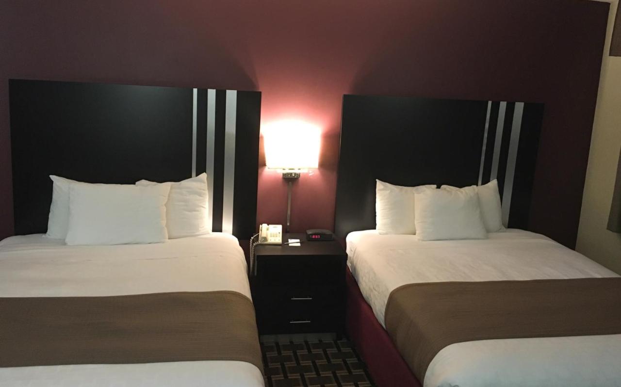 Queen Room with Two Queen Beds - Non-Smoking at AmericInn by Wyndham Inver Grove Heights Minneapolis