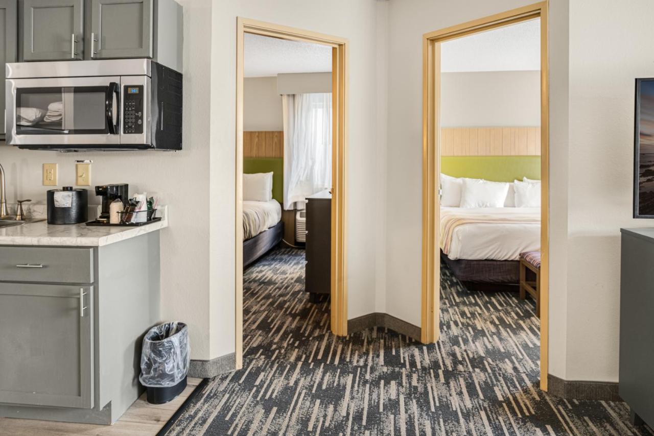 Extended Stay Two-Bedroom Suite with One King and Two Queen Beds - Kitchenette/Non-Smoking at Country Inn & Suites by Radisson, Brookings, SD