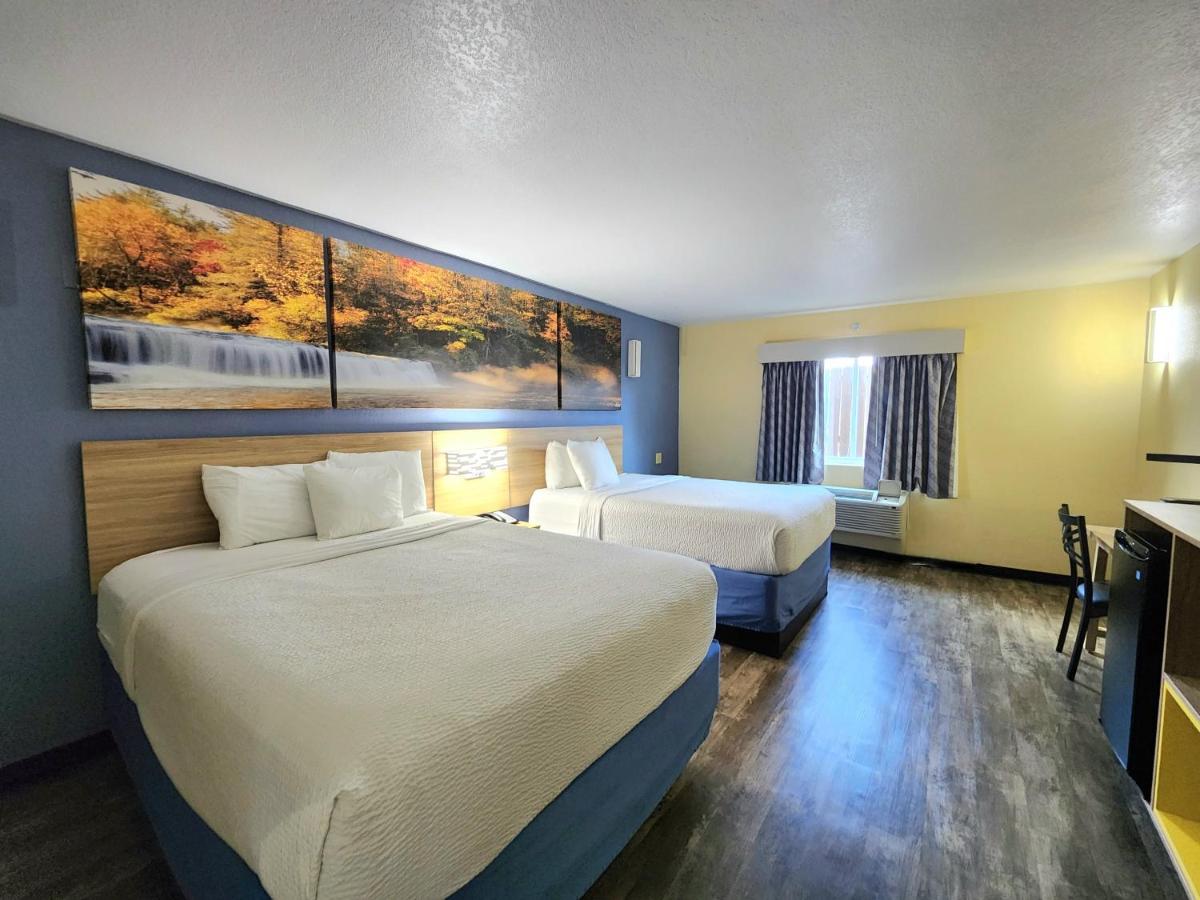 Queen Room with Two Queen Beds - Non-Smoking at Days Inn by Wyndham New Orleans Pontchartrain