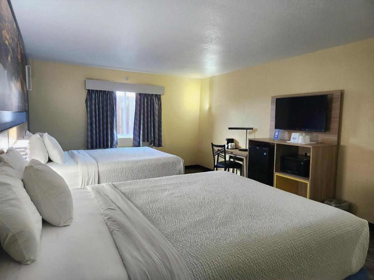 Queen Room with Two Queen Beds - Non-Smoking at Days Inn by Wyndham New Orleans Pontchartrain