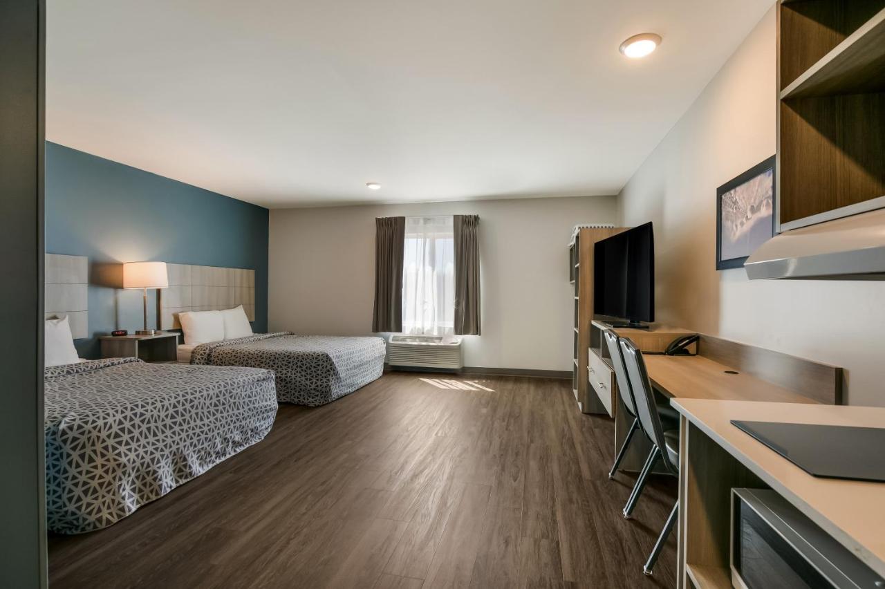 Quadruple Room with Two Queen Beds and Tub - Disability Access/Non Smoking at WoodSpring Suites Concord-Charlotte Speedway