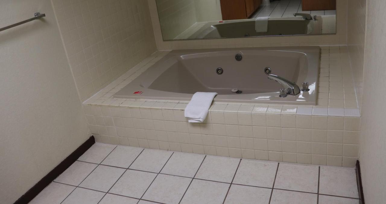 Suite with Two Queen Beds, One King Bed and Whirlpool - Non-Smoking at Econo Lodge Inn & Suites Wisconsin Dells