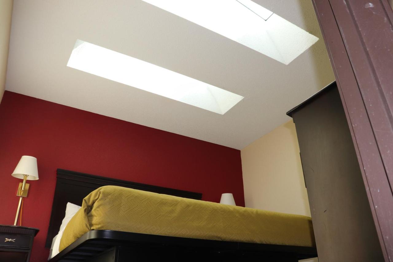 Suite with Two Queen Beds, One King Bed and Whirlpool - Non-Smoking at Econo Lodge Inn & Suites Wisconsin Dells
