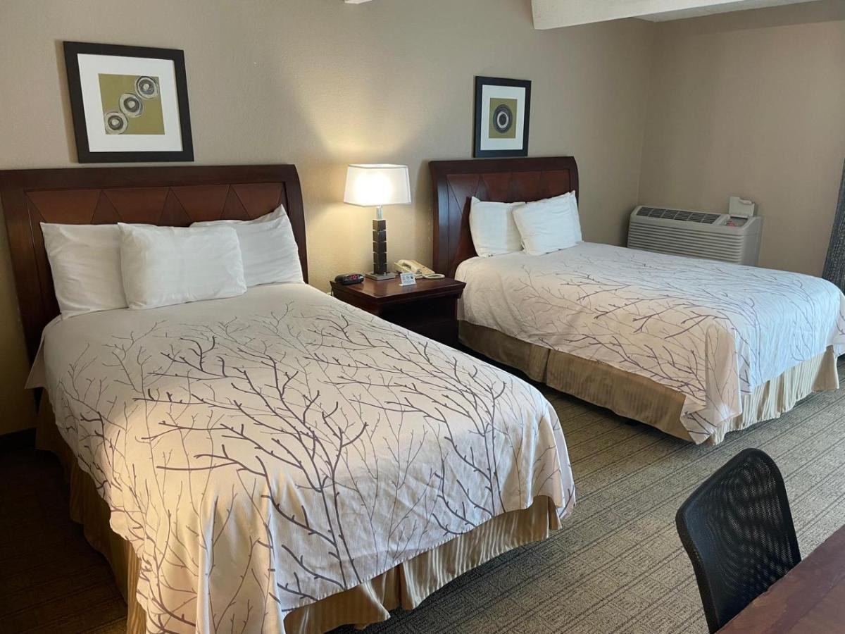 Double Room with Two Double Beds at Eastland Suites Extended Stay Hotel & Conference Center