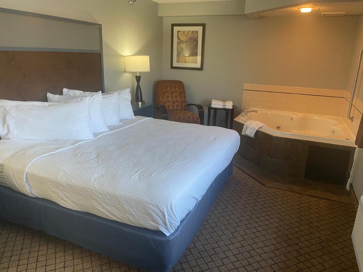 King Bed, Premier One-Bedroom Suite, Non-Smoking at AmericInn by Wyndham Hartford WI