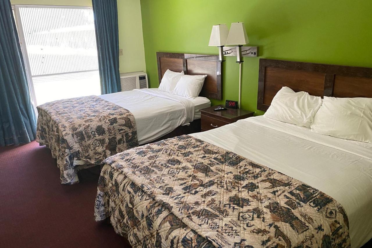 Queen Room with Two Queen Beds at OYO Hotel Yuma AZ Desert Grove