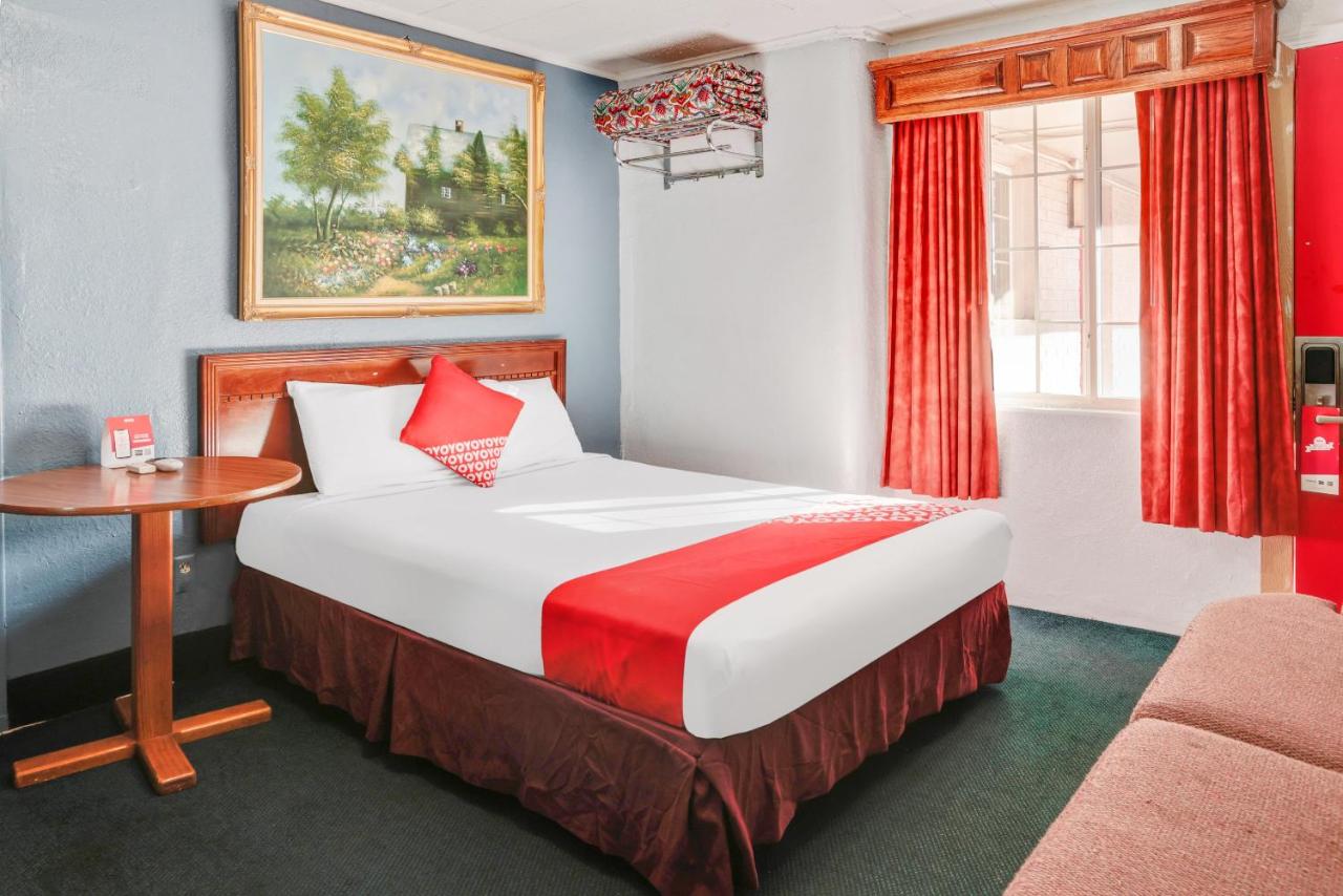 1 Queen Bed & 2 Full Bed Smoking at OYO Hotel Liberal, Kansas