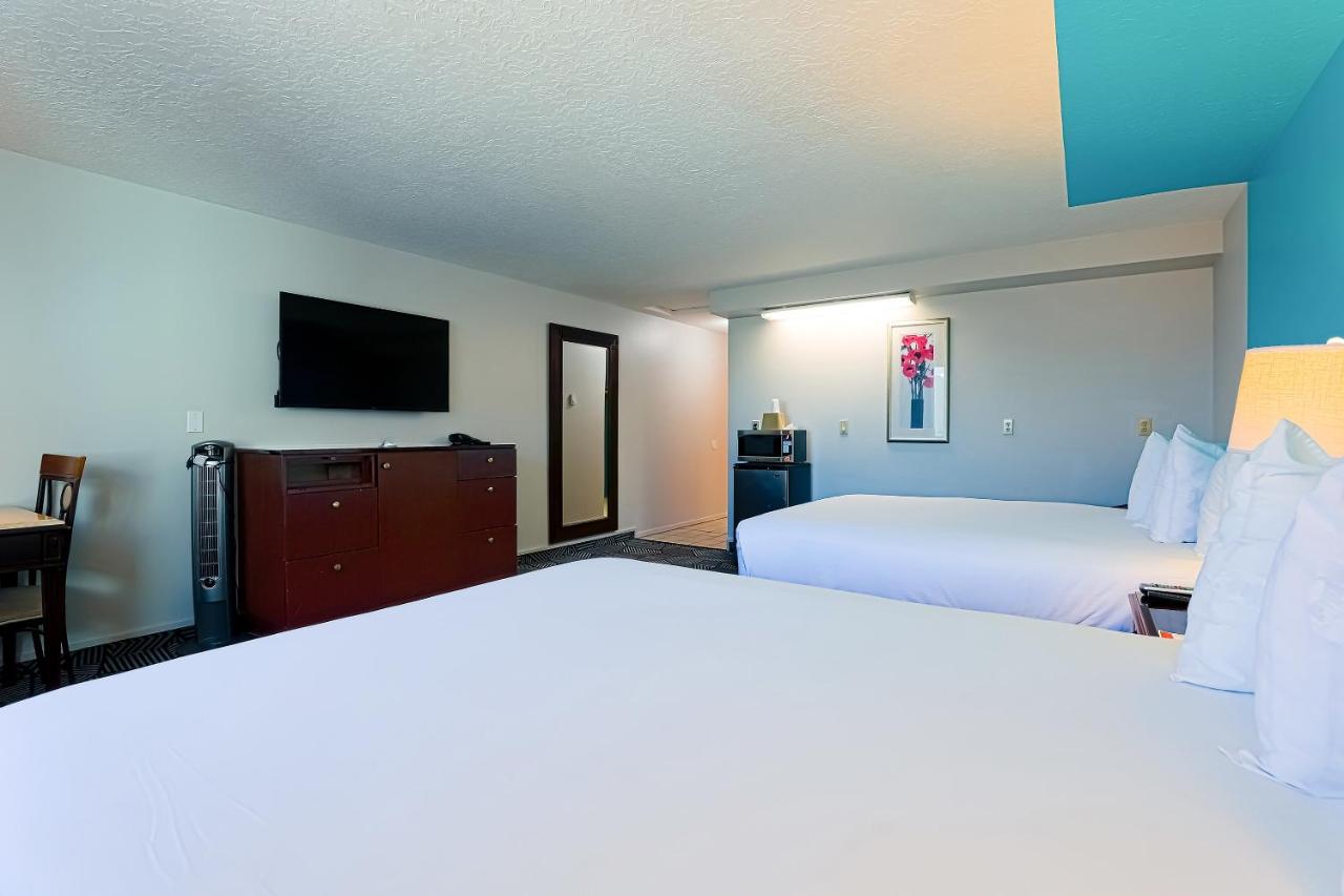 Queen Room with Two Queen Beds at Coast River Inn by OYO Seaside