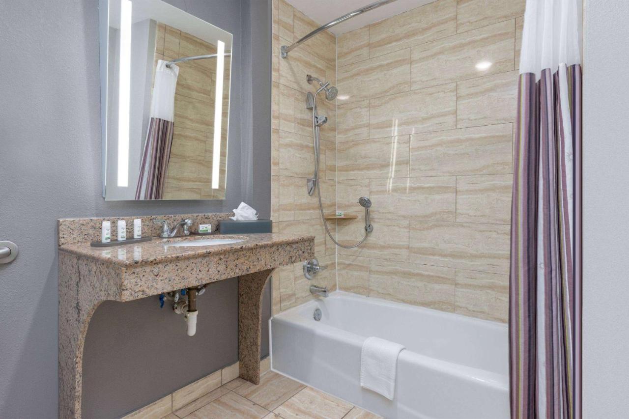 Queen Room with Two Queen Beds and Bath Tub - Mobility/Hearing Accessible - Non-Smoking at La Quinta Inn & Suites by Wyndham Allen at The Village