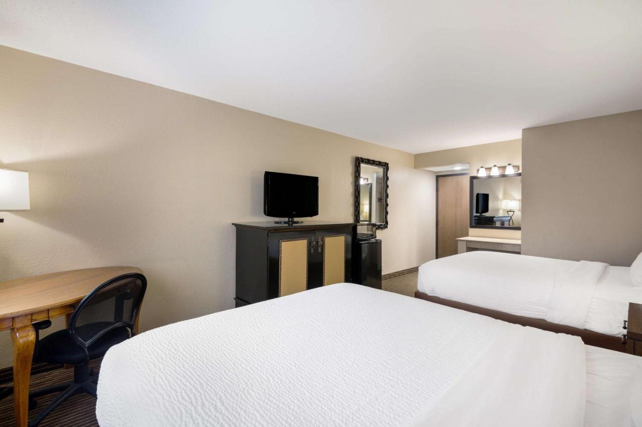 Queen Room with Two Queen Beds - Poolside at Revel Hotel Minot, SureStay Collection by Best Western