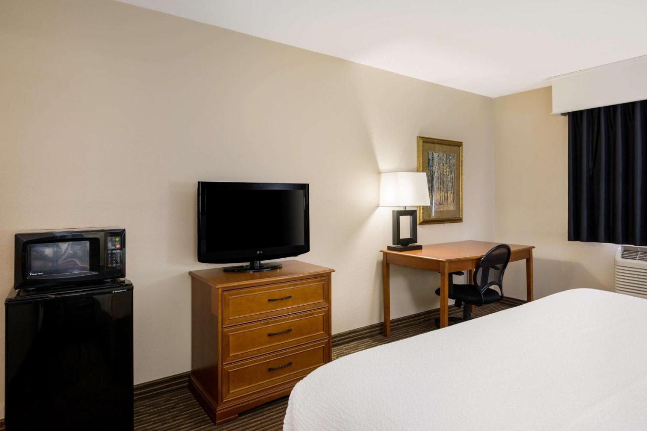 Queen Room with Roll-In Shower - Disability Access at Revel Hotel Minot, SureStay Collection by Best Western