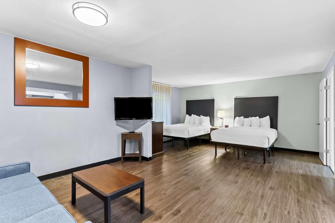 Suite with Mobility Accessible Roll-In Shower at SureStay Studio by Best Western Pensacola