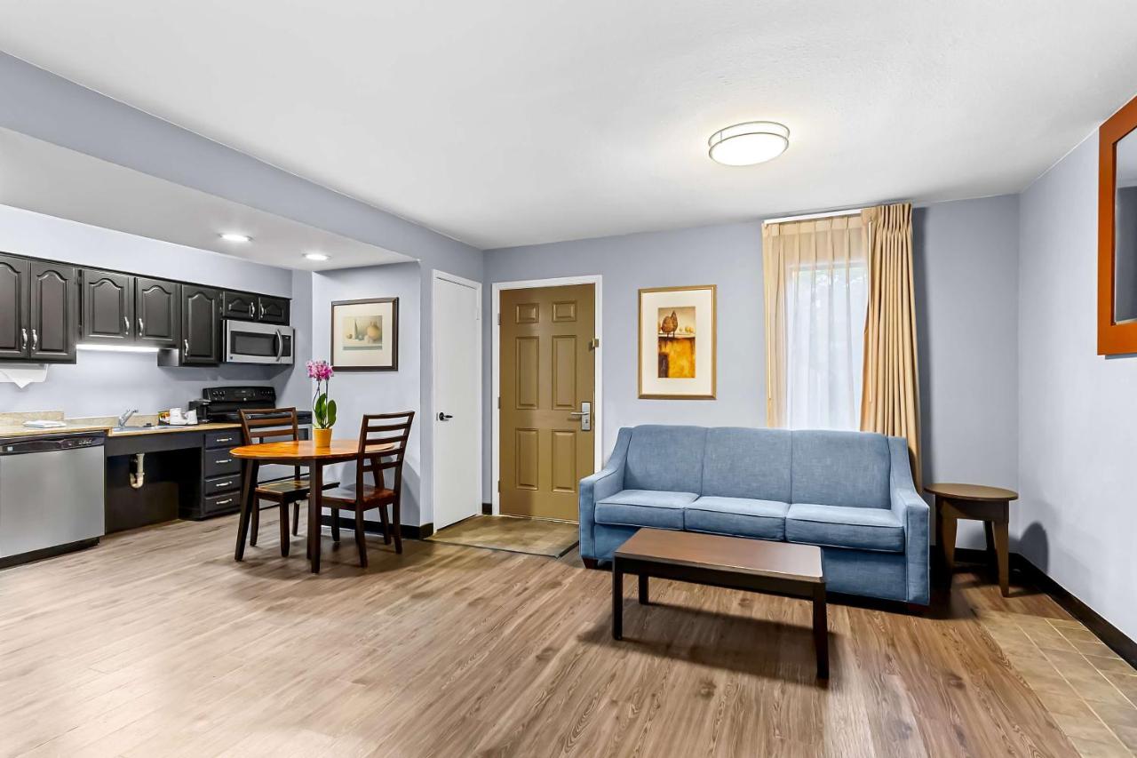 Suite with Mobility Accessible Roll-In Shower at SureStay Studio by Best Western Pensacola