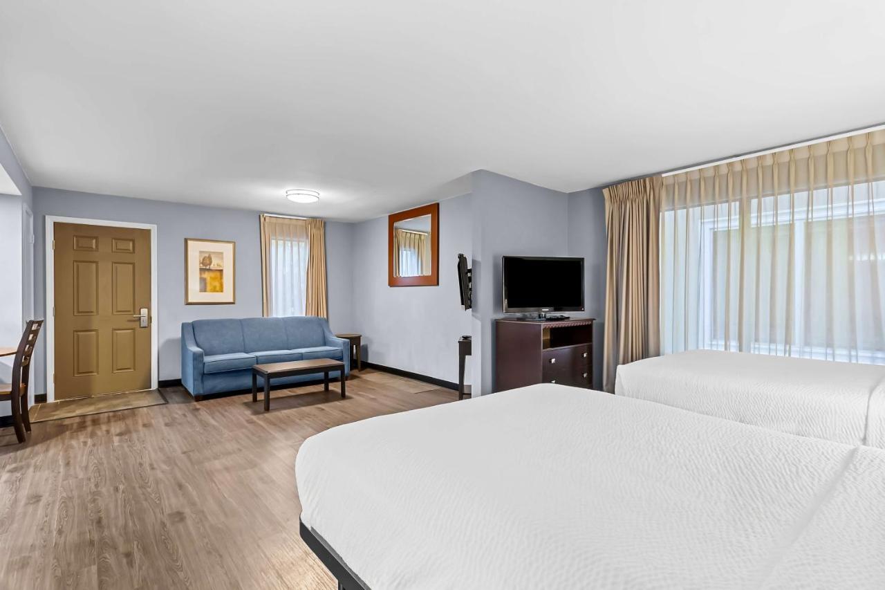 Suite with Mobility Accessible Roll-In Shower at SureStay Studio by Best Western Pensacola