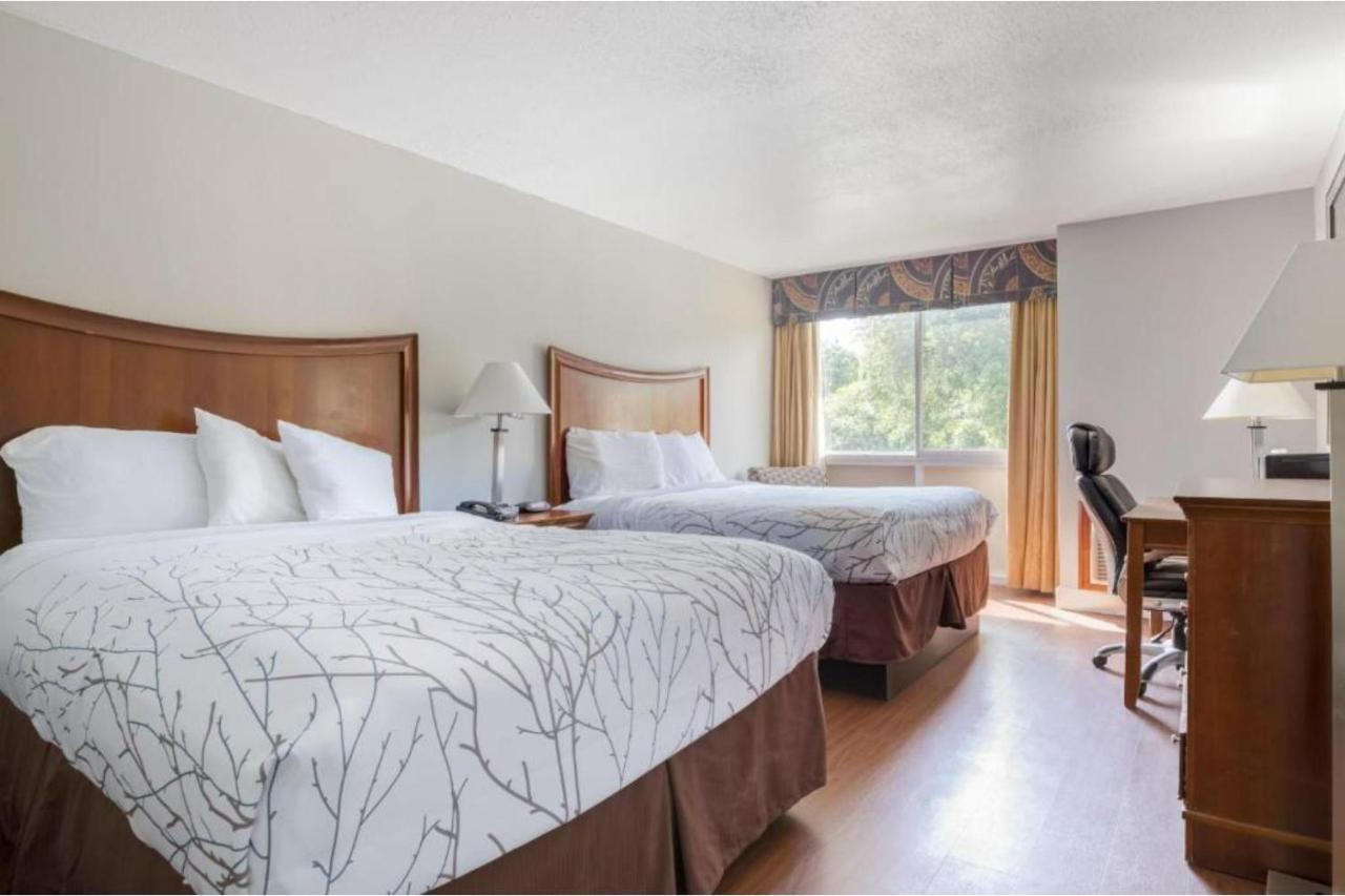 Queen Room with Two Queen Beds at Gardentree Hotels Memphis East near I 40