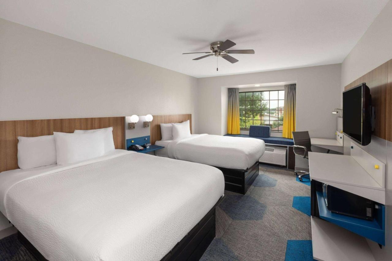 Queen Room with Two Queen Beds - Non-Smoking at Microtel Inn & Suites by Wyndham Buda Austin South