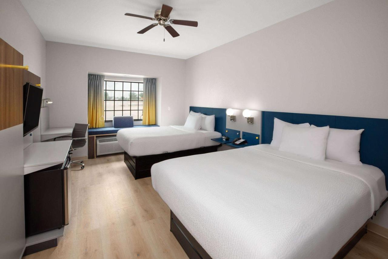 Queen Room with Two Queen Beds - Disability Access at Microtel Inn & Suites by Wyndham Buda Austin South
