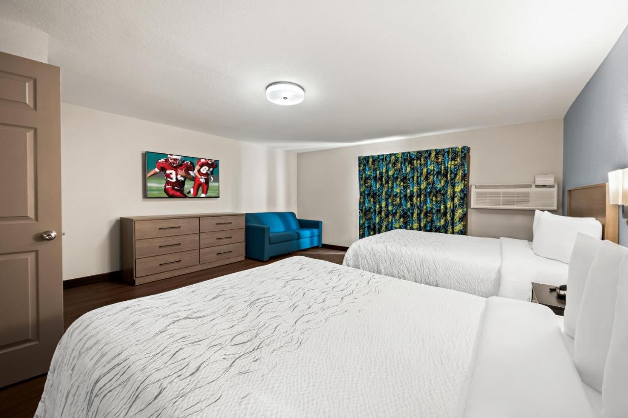 Suite with Two Queen Beds with Kitchen Disability Access Smoke Free at Red Roof Inn PLUS+ & Suites Naples Downtown-5th Ave S