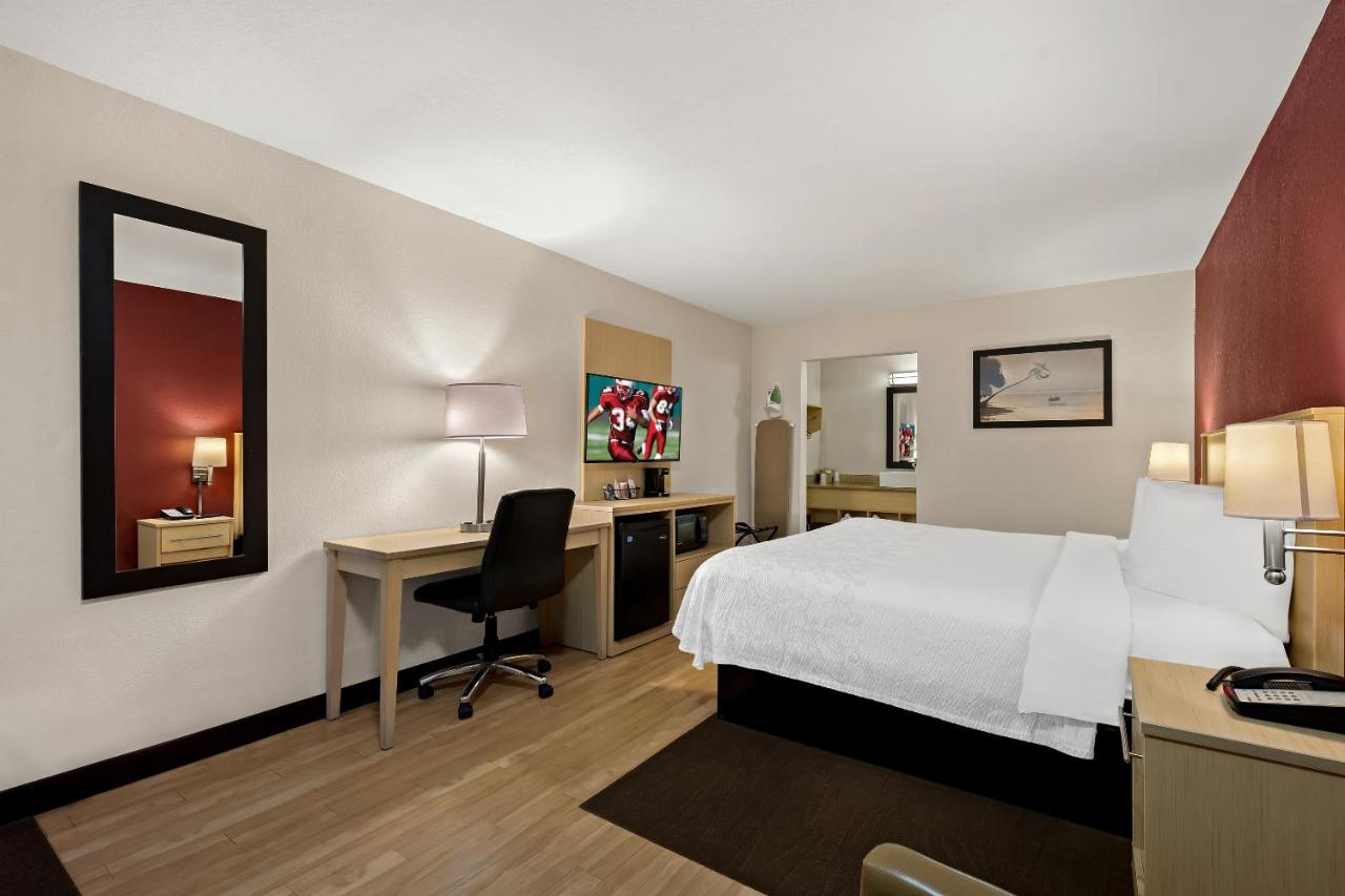 Superior King Room Poolside Smoke Free at Red Roof Inn PLUS+ & Suites Naples Downtown-5th Ave S