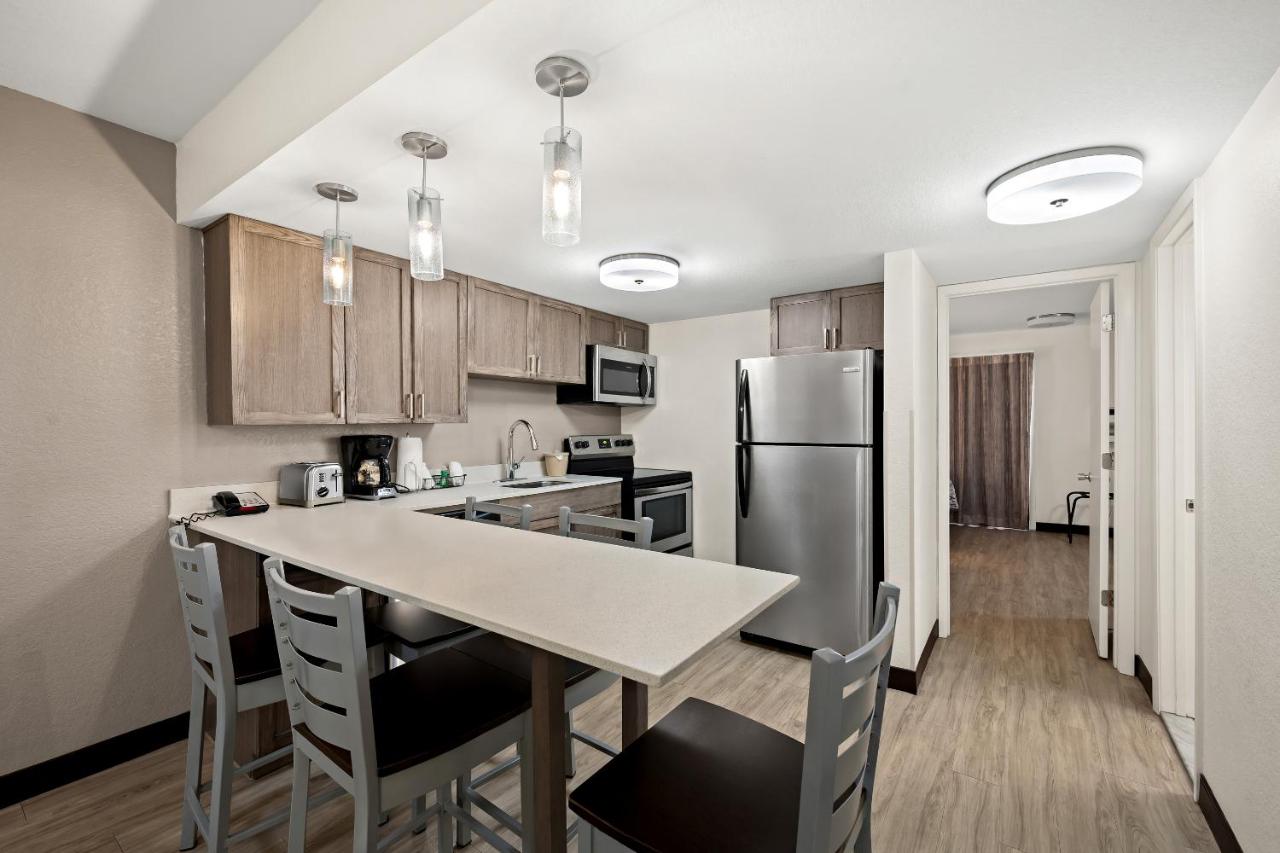 Suite with Two Queen Beds with Kitchen Poolside Smoke Free at Red Roof Inn PLUS+ & Suites Naples Downtown-5th Ave S