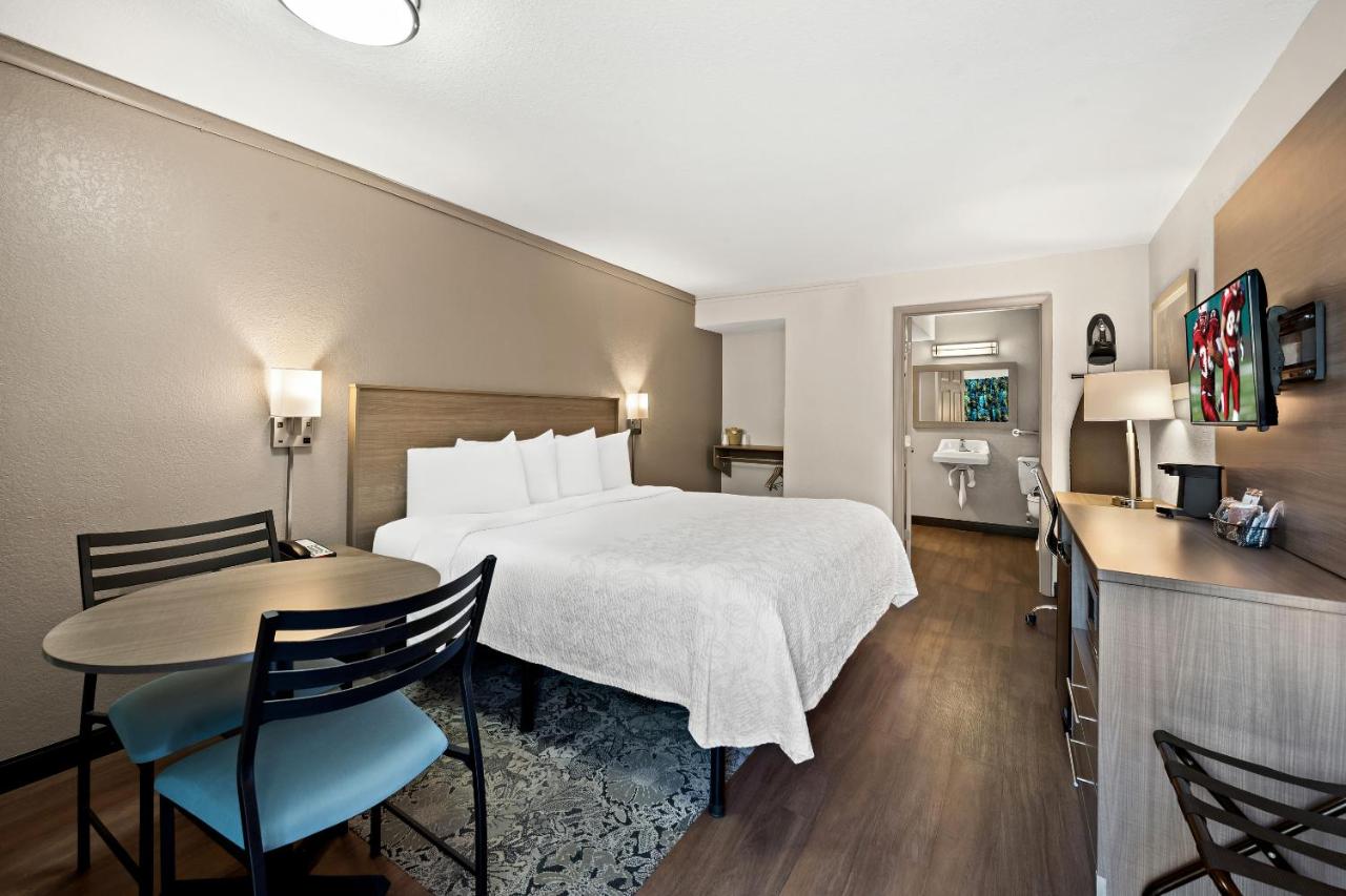 Premium King Room Disability Access Smoke Free (Upgraded Bedding & Snack) at Red Roof Inn PLUS+ & Suites Naples Downtown-5th Ave S