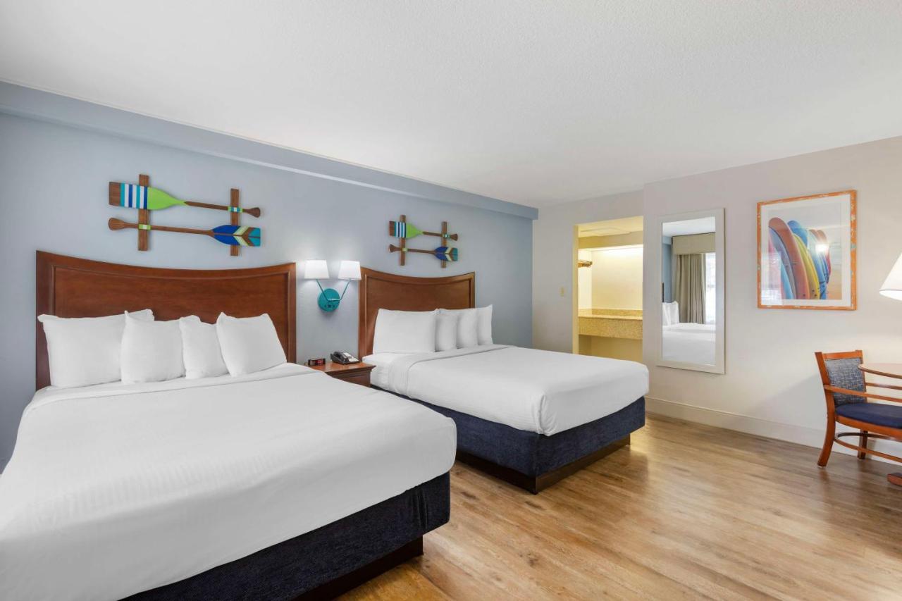 Queen Room with Two Queen Beds - Courtyard View at Best Western Cocoa Beach - Port Canaveral