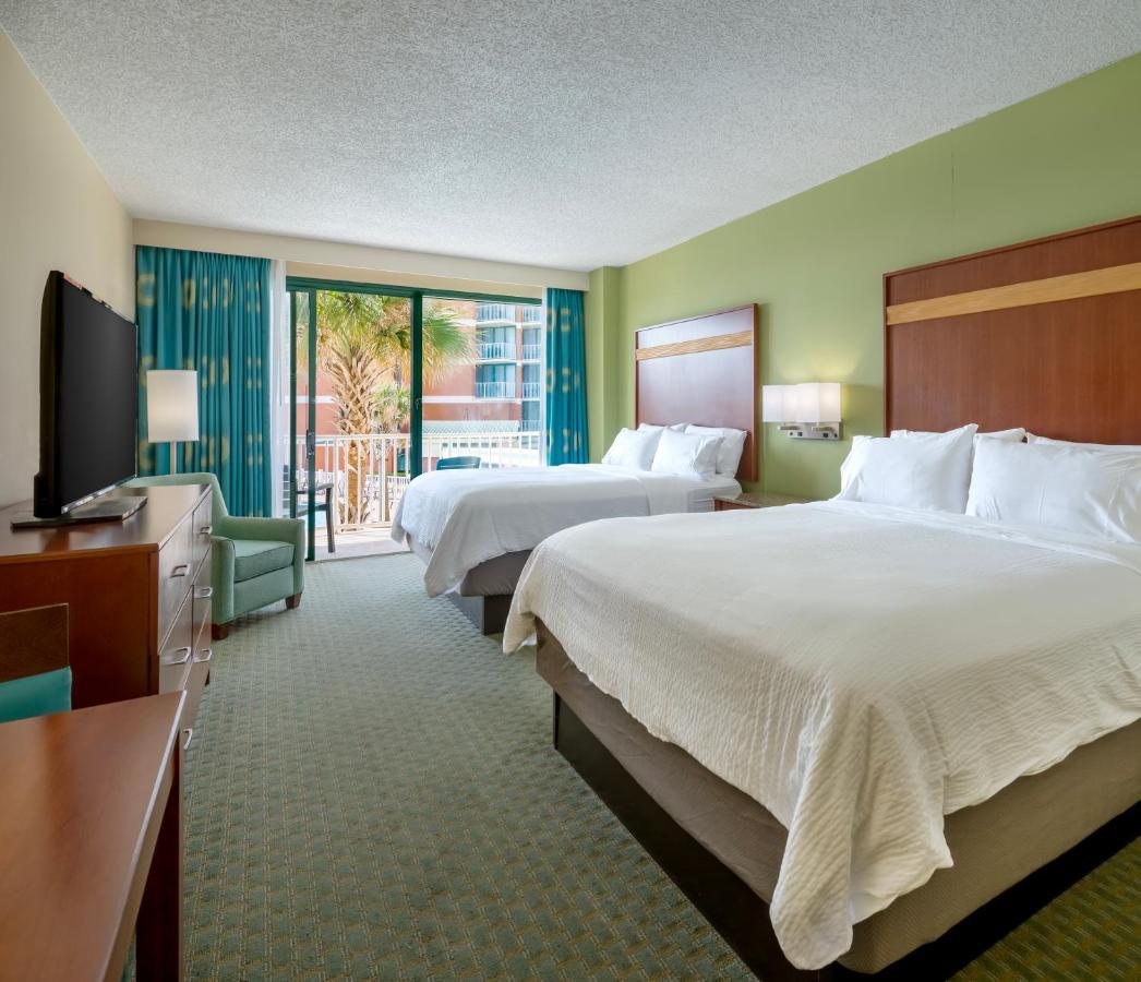 Queen Room with Two Queen Beds - Poolside at Holiday Inn & Suites Virginia Beach North Beach, an IHG Hotel