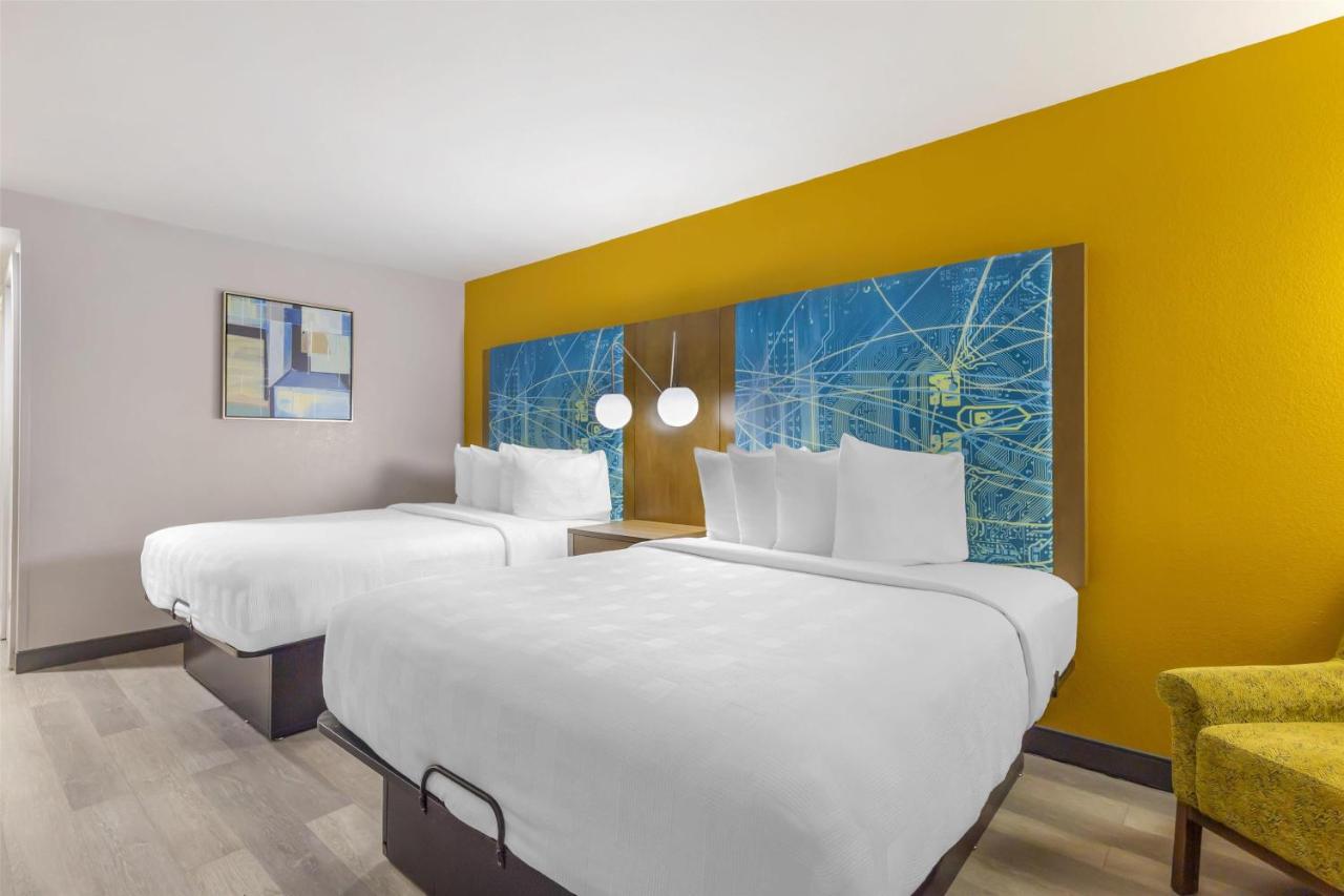 Queen Suite with Two Queen Beds and Sofa Bed at Best Western Plus Raleigh Crabtree Valley Hotel