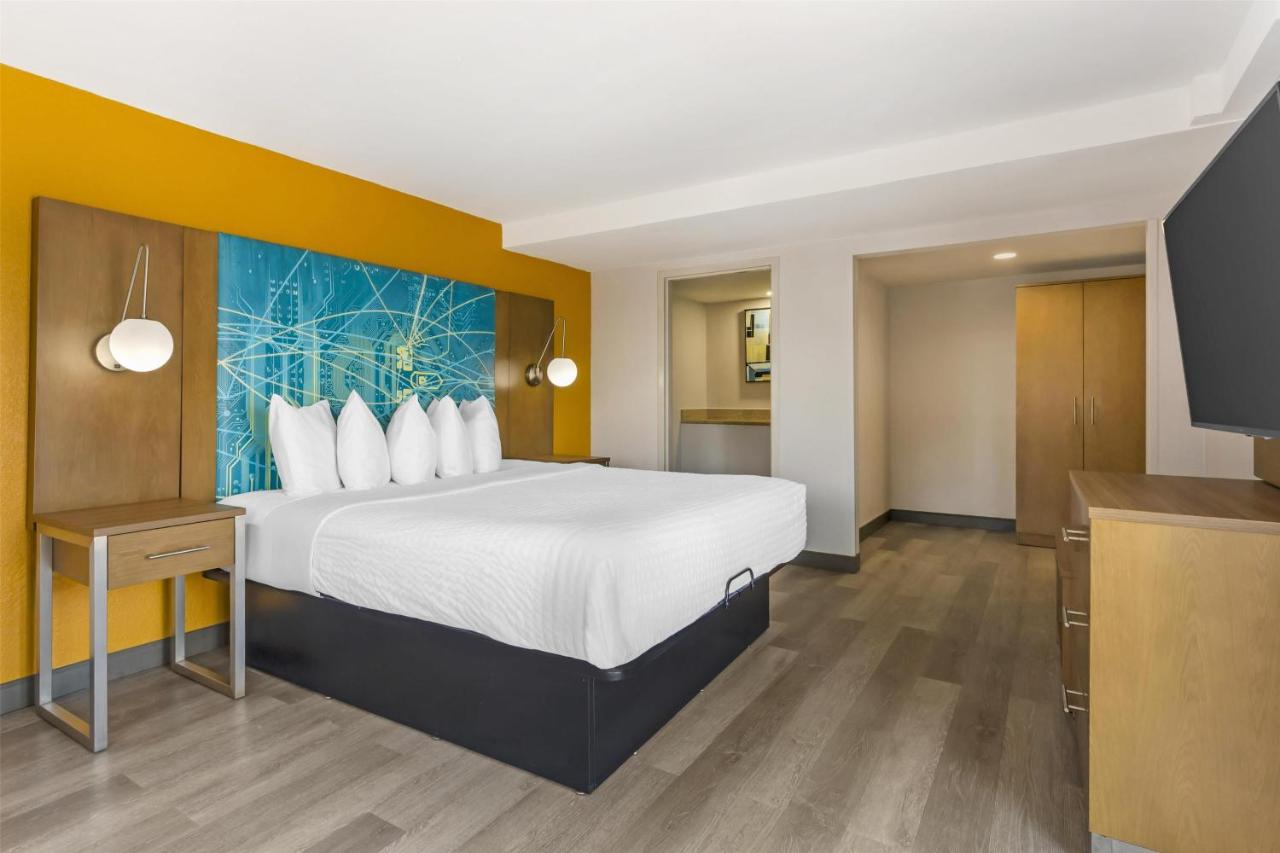 King Suite with Sofa Bed and Balcony at Best Western Plus Raleigh Crabtree Valley Hotel
