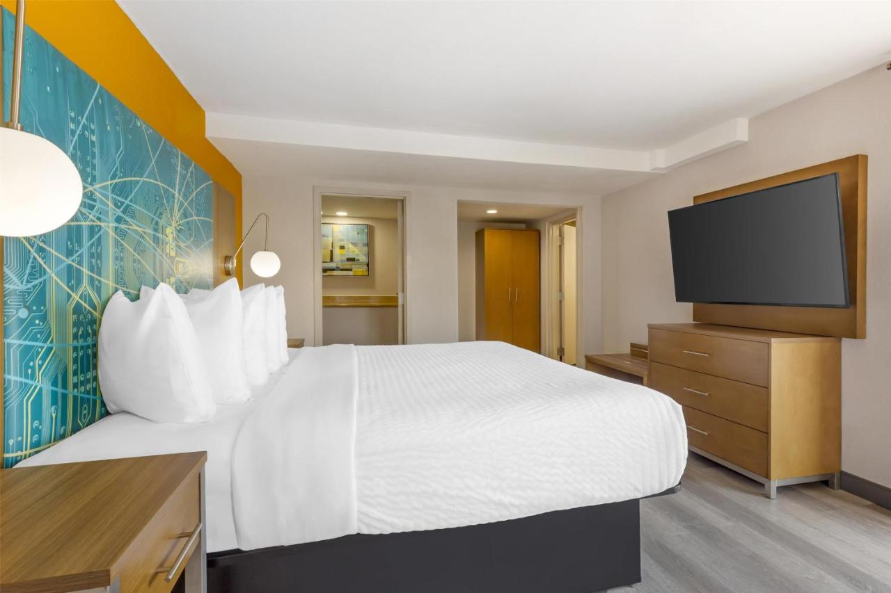 King Suite with Sofa Bed and Balcony at Best Western Plus Raleigh Crabtree Valley Hotel
