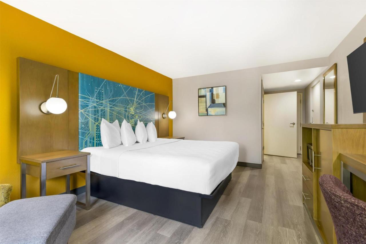 King Room with Mobility Accessible Roll-In Shower at Best Western Plus Raleigh Crabtree Valley Hotel
