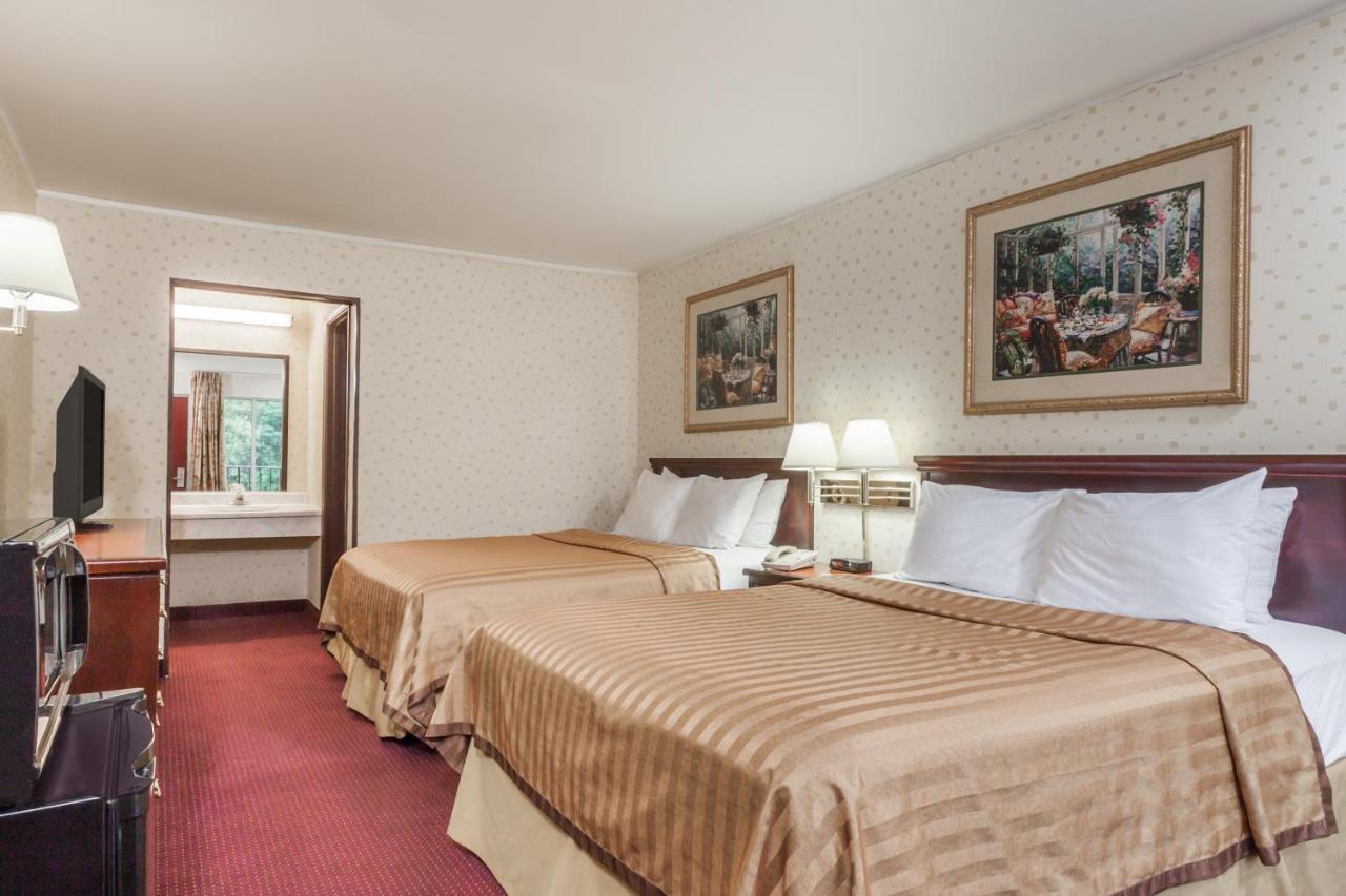 Double Room with Two Double Beds - Disability Access - Non-Smoking at Travelodge by Wyndham Seymour