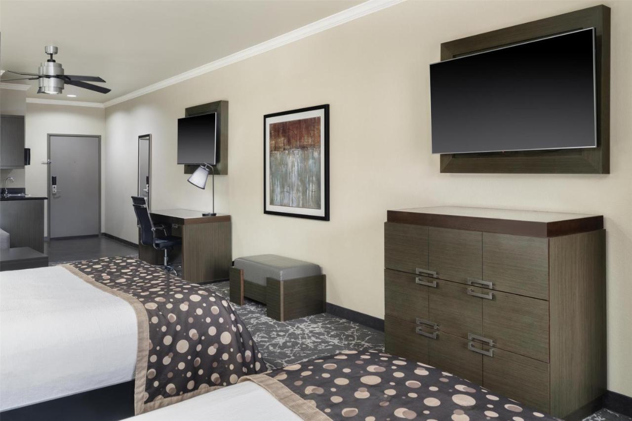 Queen Suite with Two Queen Beds with Sofa Bed at Best Western Premier Crown Chase Inn & Suites