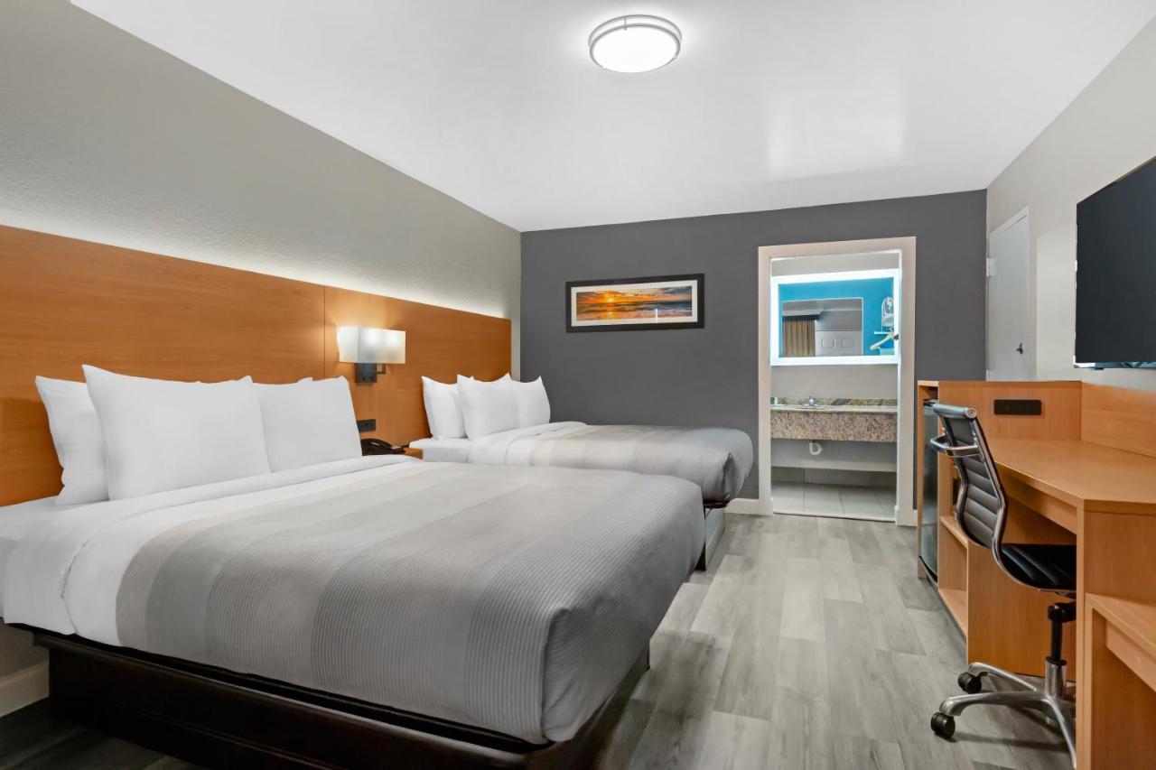 Queen Room with Two Queen Beds - Non Smoking at Quality Inn and Conference Center Tampa-Brandon