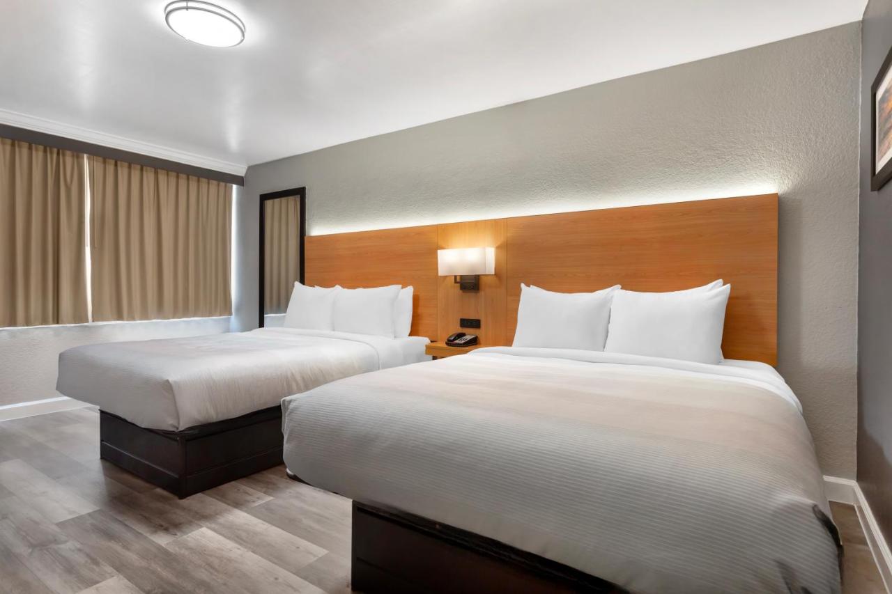 Queen Room with Two Queen Beds - Non Smoking at Quality Inn and Conference Center Tampa-Brandon