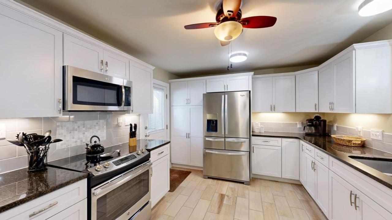  | 719 Queens Grant