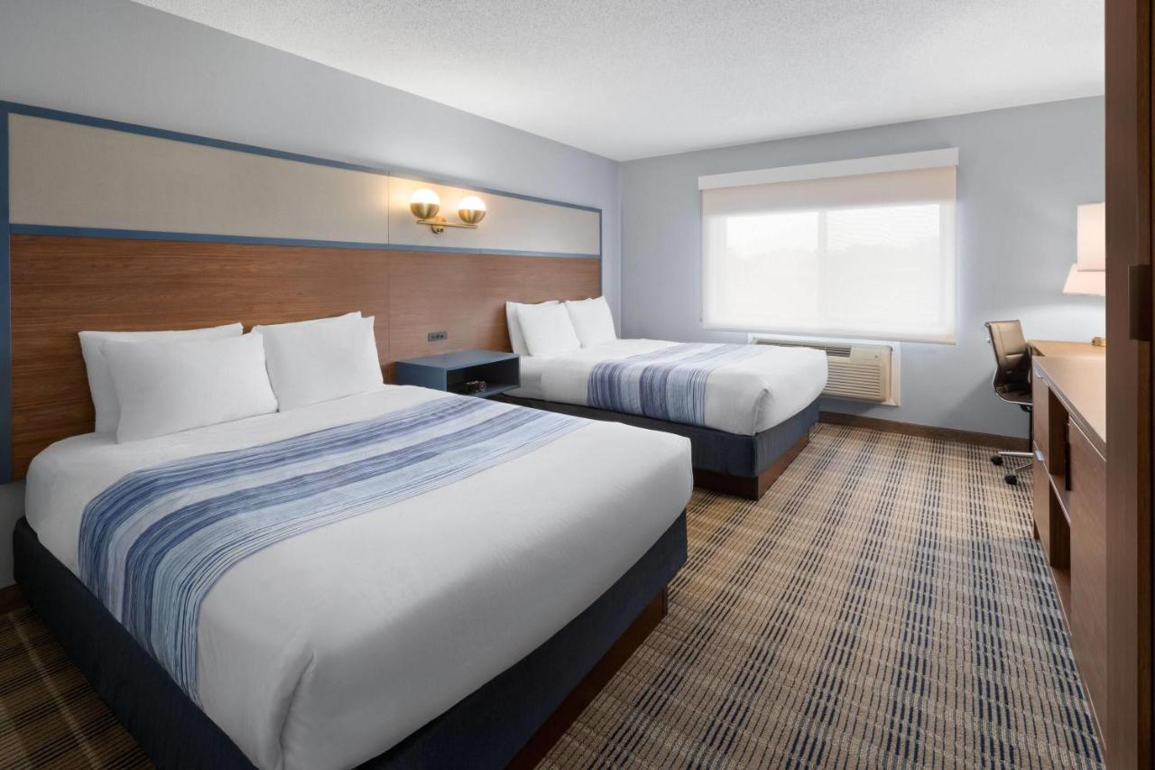 Queen Room with Two Queen Beds - Non-Smoking at AmericInn by Wyndham Chippewa Falls