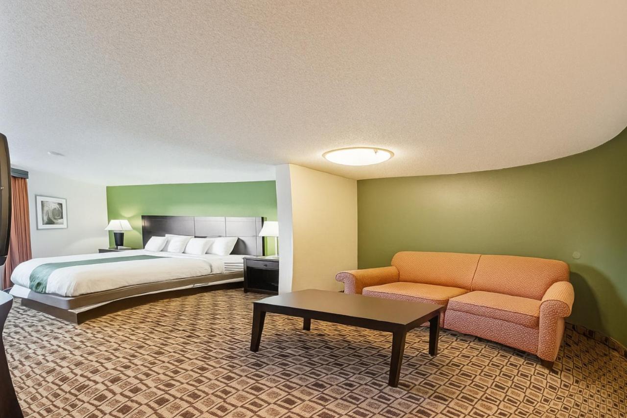 Standard King Suite - Non-Smoking Jetted tub  at Coratel Plus Suites Wichita West Airport