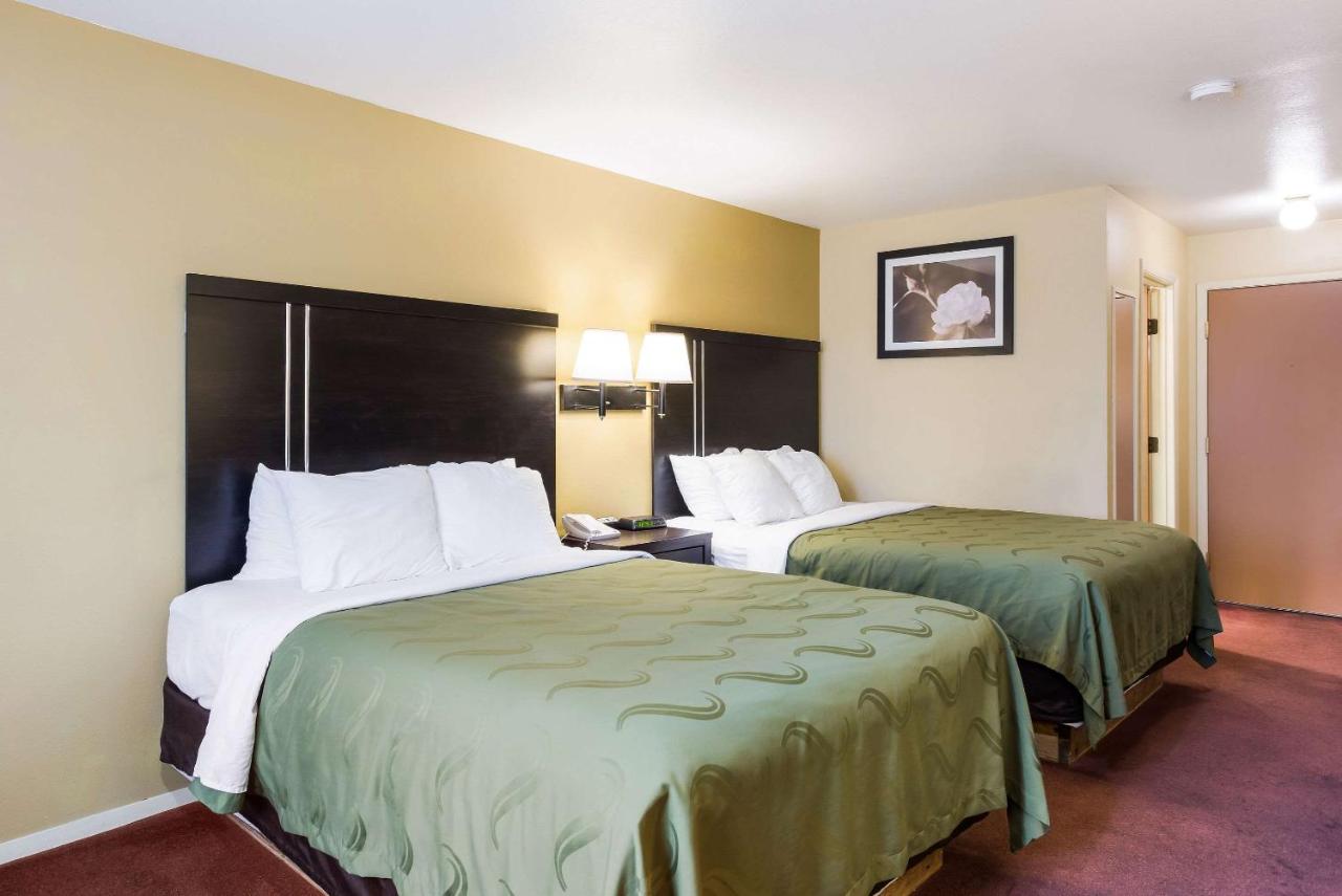 Queen Room with Two Queen Beds at Quality Inn Airport