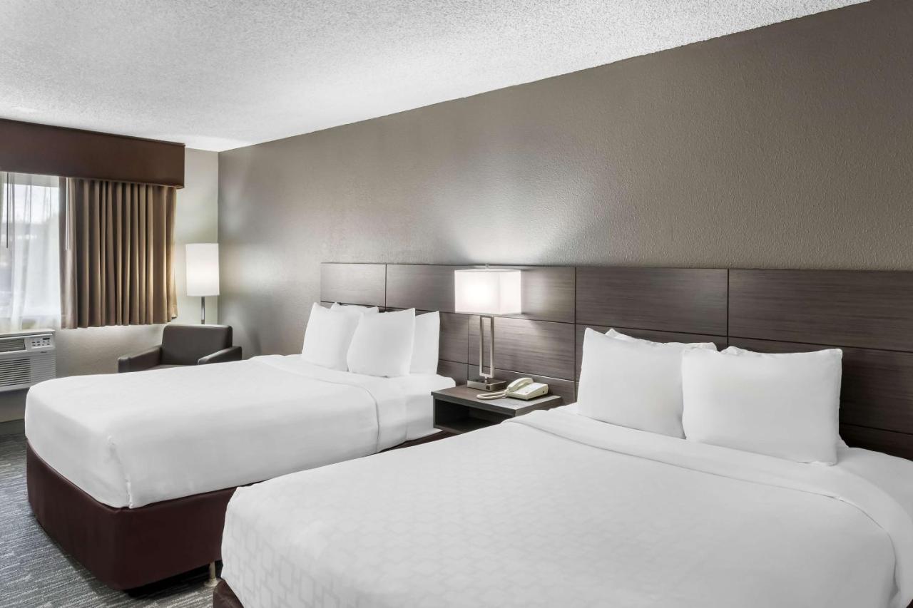 Queen Room with Two Queen Beds at SureStay Hotel by Best Western SeaTac Airport North