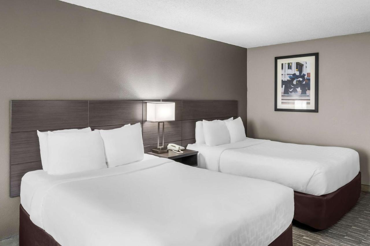 Queen Room with Two Queen Beds at SureStay Hotel by Best Western SeaTac Airport North